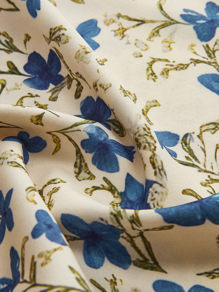 Aroa - Vestido con estampado floral y bajo irregular anudado